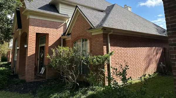 Side view of the front gable after roof replacement in Houston, TX