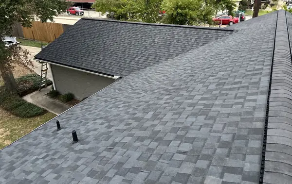 Charcoal laminate roof over new decking on a Spring Branch home in Houston 77043
