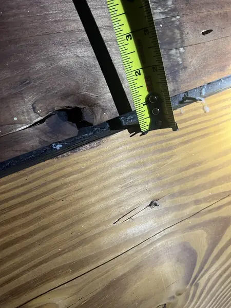 Measuring rot around a pipe penetration on a Spring Branch roof