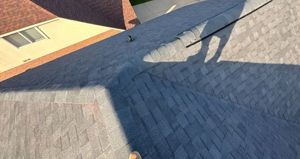 Second-story wall flashing on a January 2026 roof replacement in Houston, TX