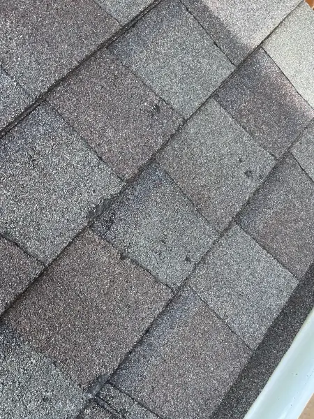 Close view of Landmark Pro Max Def shingles in Weathered Wood