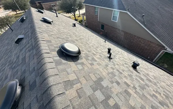 New vents and ridge caps on a Peppercorn roof in Tomball