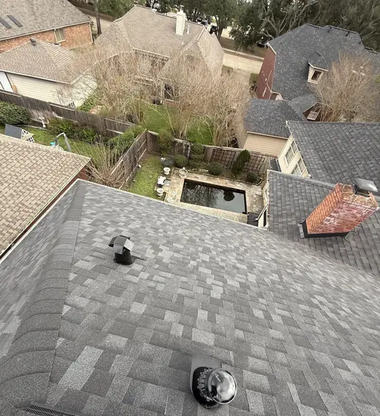 Replaced roof and dome vent looking across the neighborhood in Houston