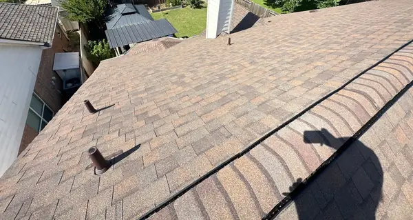 New pipe boots on a replaced hip roof in northwest Houston
