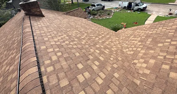 Brick chimney re-flashed on a new Houston roof