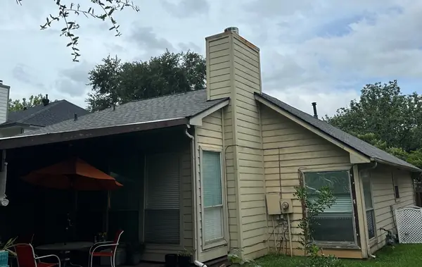 Steep slope with fresh laminate shingles in Sugar Land, TX