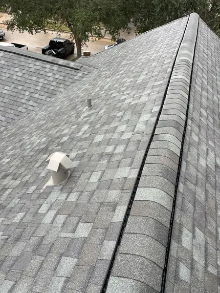 Rear slope of a replaced roof in First Colony