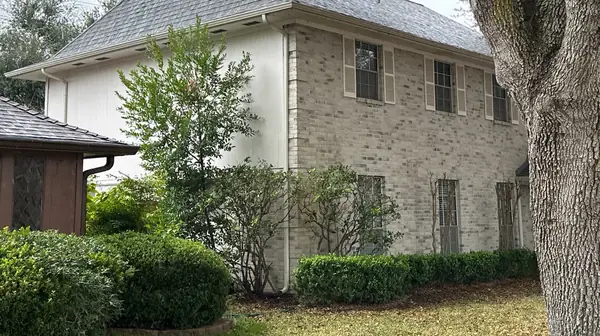 Front of a Sugar Land home with a replaced roof