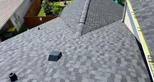 Hip ridge of a hand-nailed March 2025 roof in Pearland