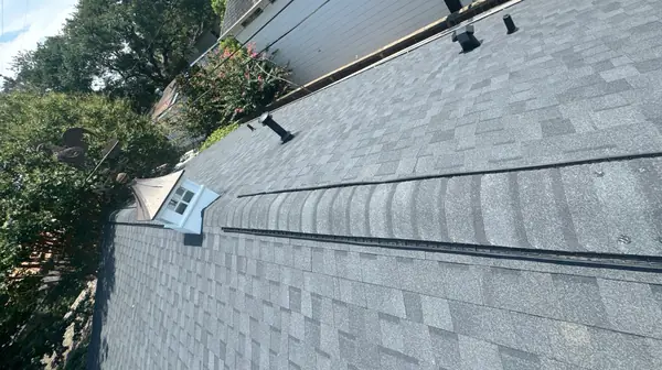 Black laminate shingles on a steep slope in Houston, TX