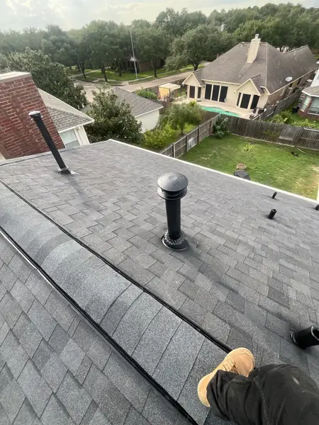 Pipe jacks and furnace vent re-flashed on a replaced Houston roof