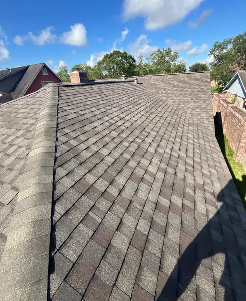 Patio cover roofed to match the house in southwest Houston