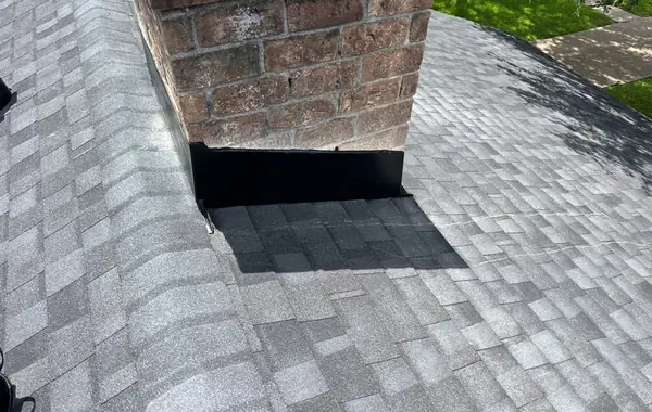 Chimney flashing detail on the completed roof
