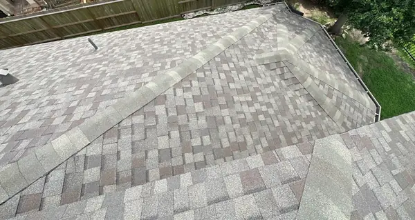 Hip ridge of a July 2025 roof replacement in League City