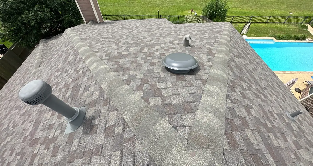 Charcoal laminate roof on a two-story League City home in 77573