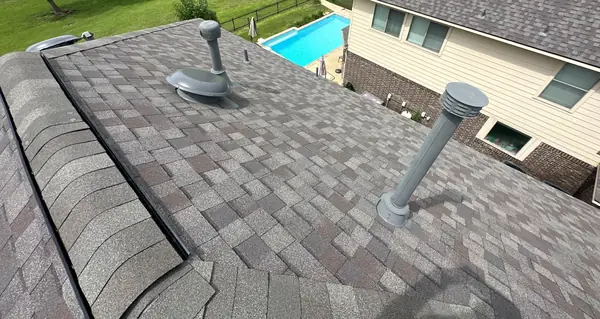 Brick chimney re-flashed on a new League City, TX roof