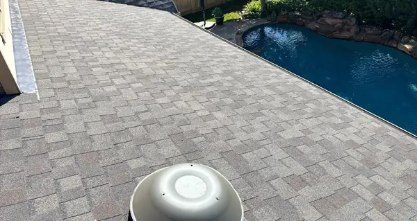 Hip ridge of a May 2025 roof replacement in League City