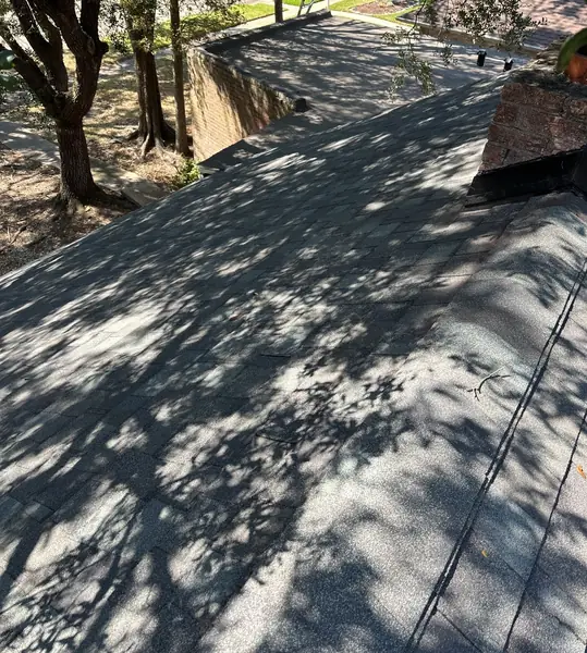 Front slope of a new shingle roof in Friendswood, TX