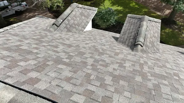 Brick chimney re-flashed on a new Houston roof