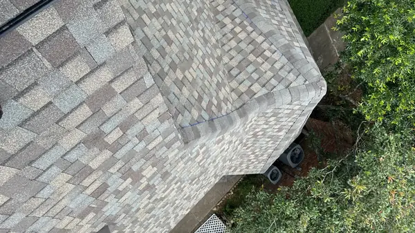 Hip lines on the completed two-story roof, Katy 77450