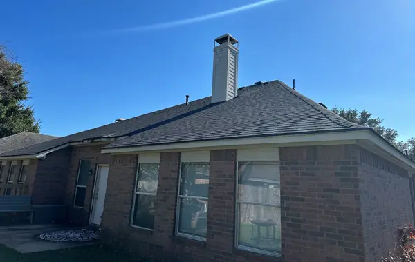 Rear elevation of a replaced roof in Richmond