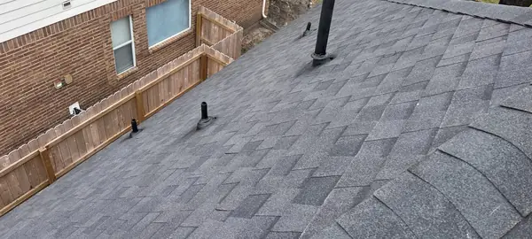 Pipe jacks and replaced shingles on a March 2025 Houston roof