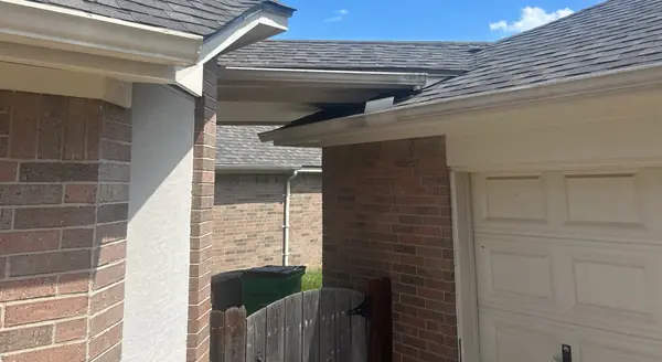 Rear corner of a Houston home after roof replacement