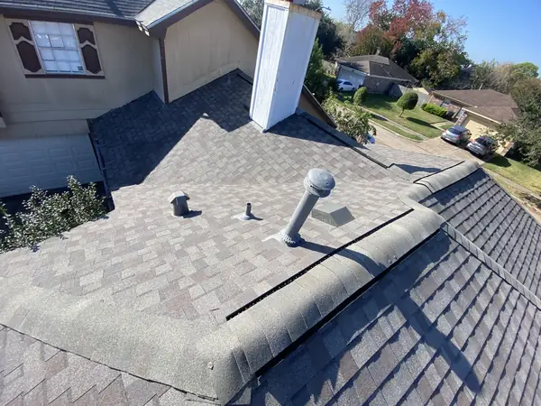 Ridge vent on a new laminate roof in Houston's Westbury area, 77035