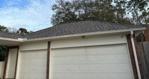 Garage roof with fresh shingles in Kingwood, TX