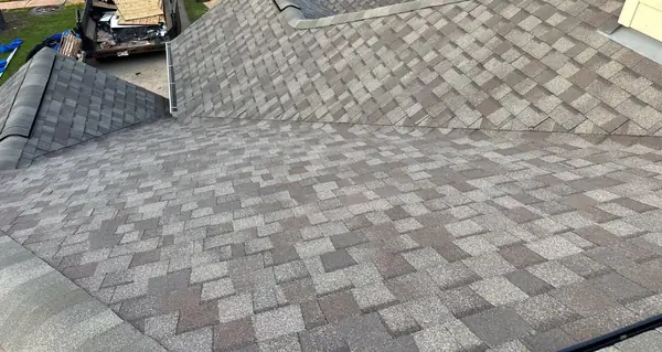 Replaced shingles on a one-story hip roof in west Houston