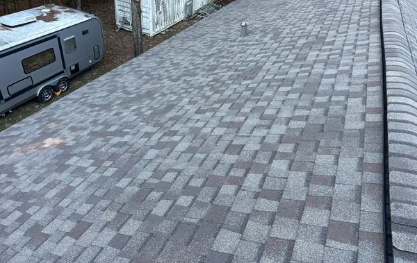 Hip ridge of a December 2025 roof replacement in Magnolia, TX