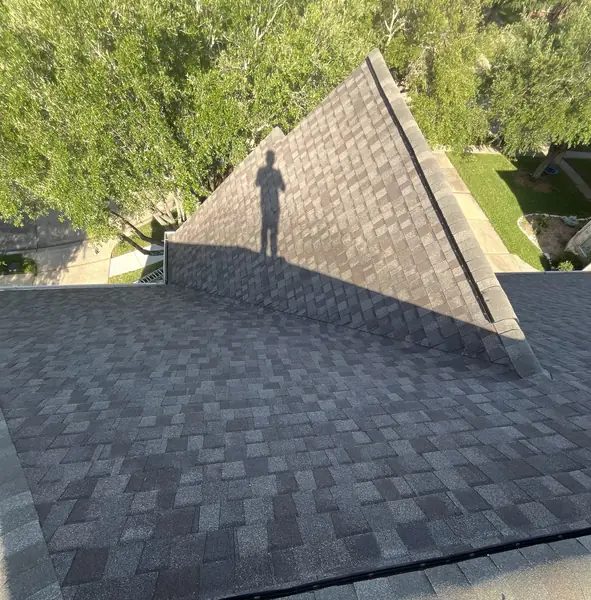 Steep front gable of a May 2025 roof replacement in Pearland