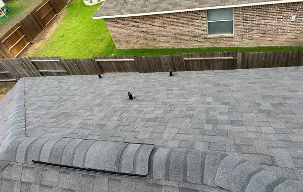 Rear slope after replacement with the fence line beyond