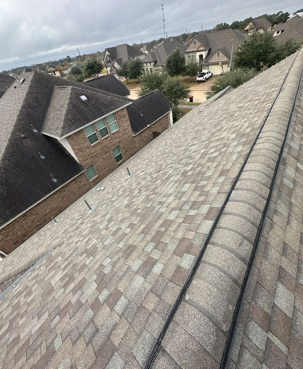 Owens Corning Driftwood roof on a two-story Richmond home in 77406