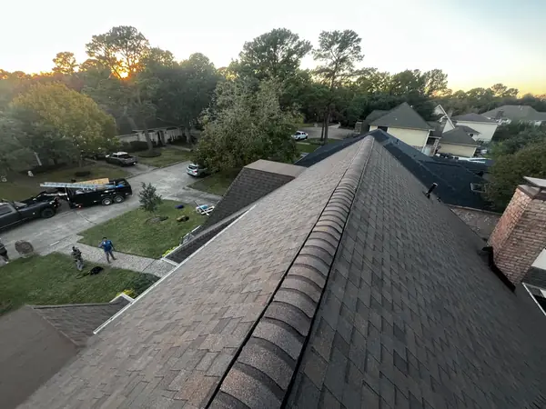 Rear hip of the finished roof above the back yard