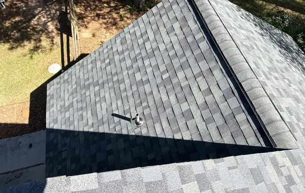 Ridge cap and valley detail on a new Hockley roof
