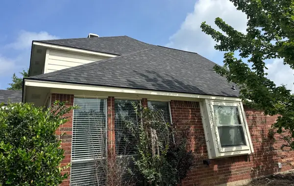 Side elevation showing the new roof and gable flashing