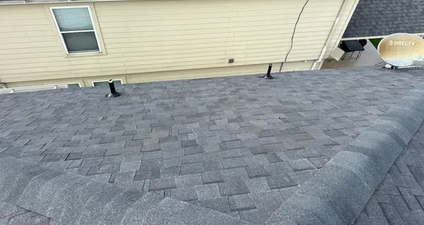 Rear 7/12 slope of a replaced roof in Houston, TX