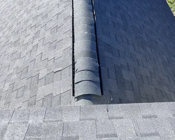 Ridge vent run on a two-story Houston roof