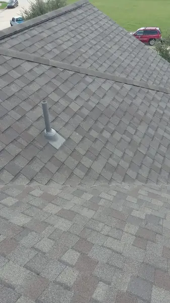 Rear slope of a new shingle roof in Houston, TX