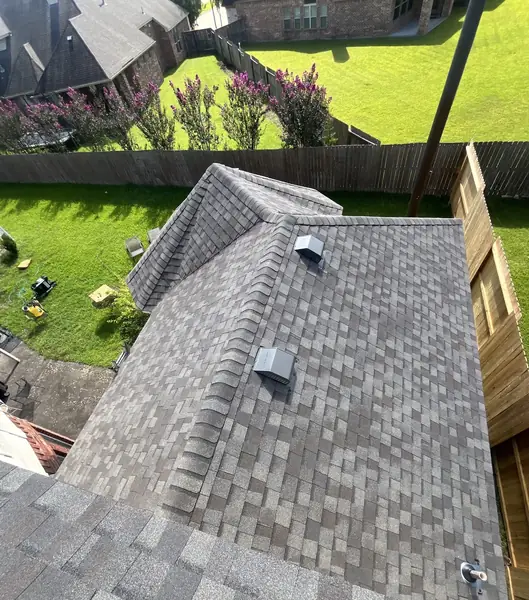 Hip ridge of a November 2025 storm restoration roof in Sugar Land