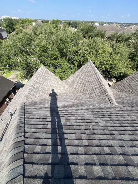 Brick chimney re-flashed on a new Sugar Land roof