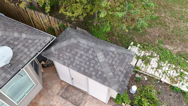 Detached garage roofed to match in Houston, TX