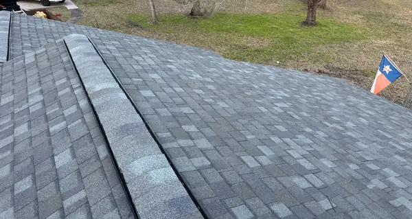 Main ridge of the new gray roof, Conroe 77303