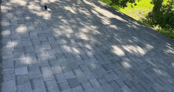 Garage gable with fresh shingles in Alvin