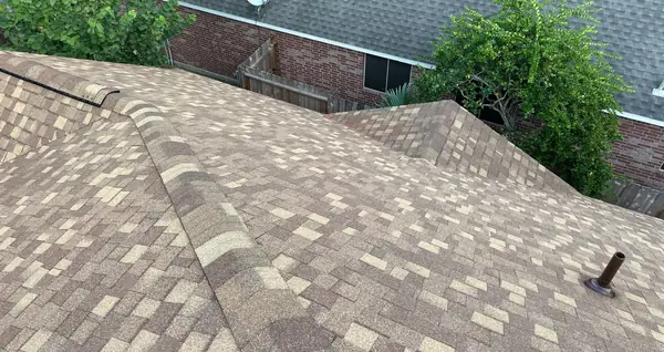 Hip ridge of an October 2025 storm restoration roof in Houston